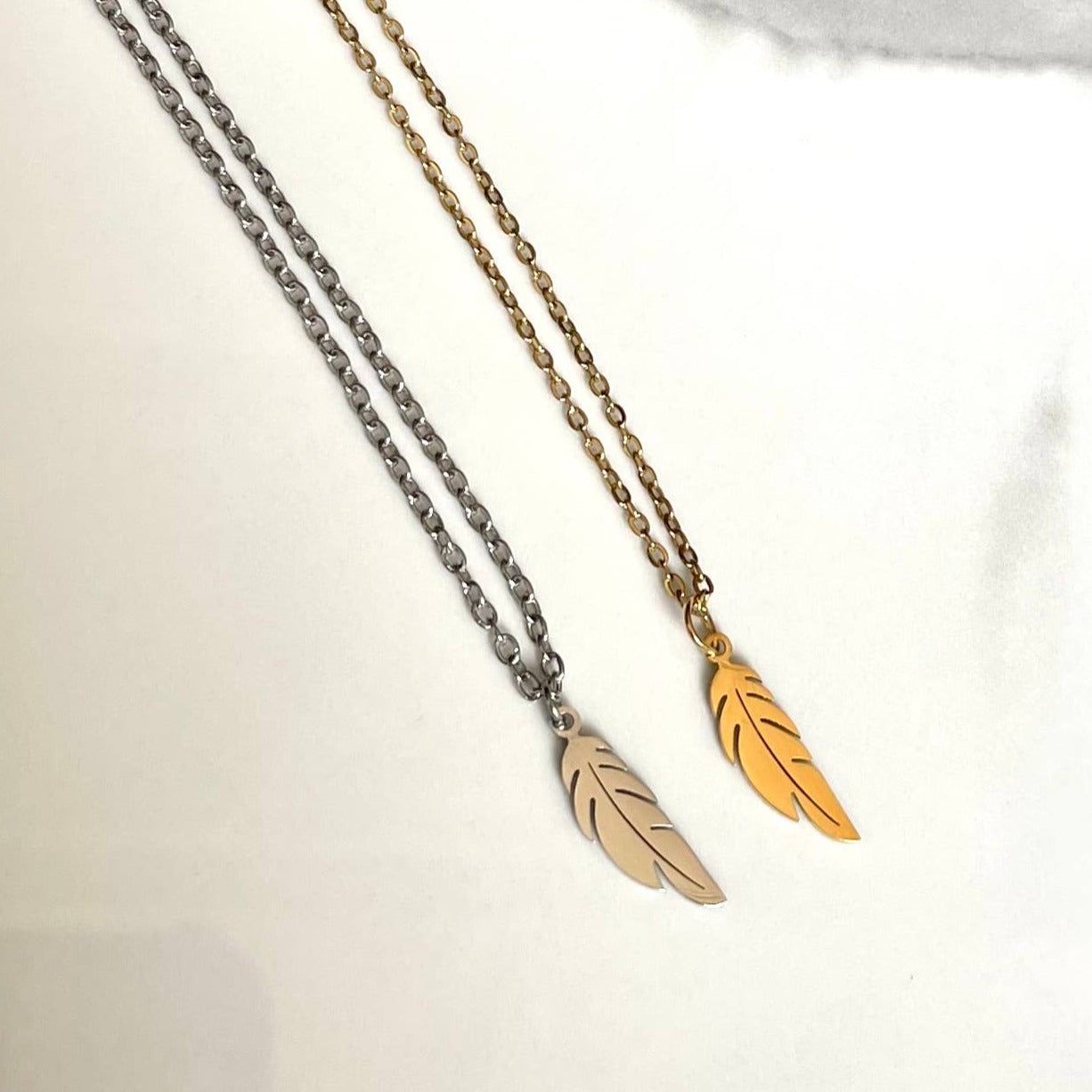 Feather Charm Necklace: Gold